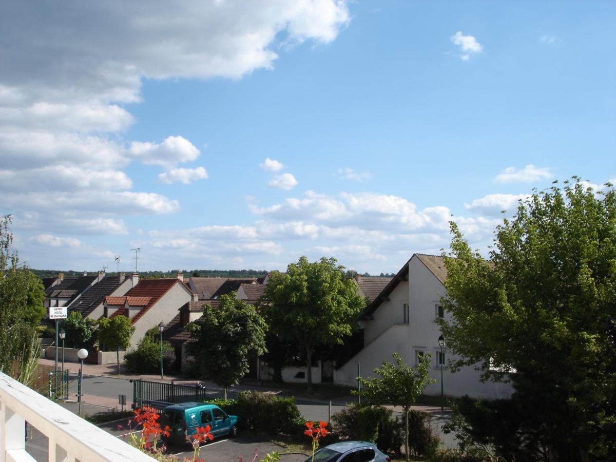 Kyriad Direct Acheres Buitenkant foto
